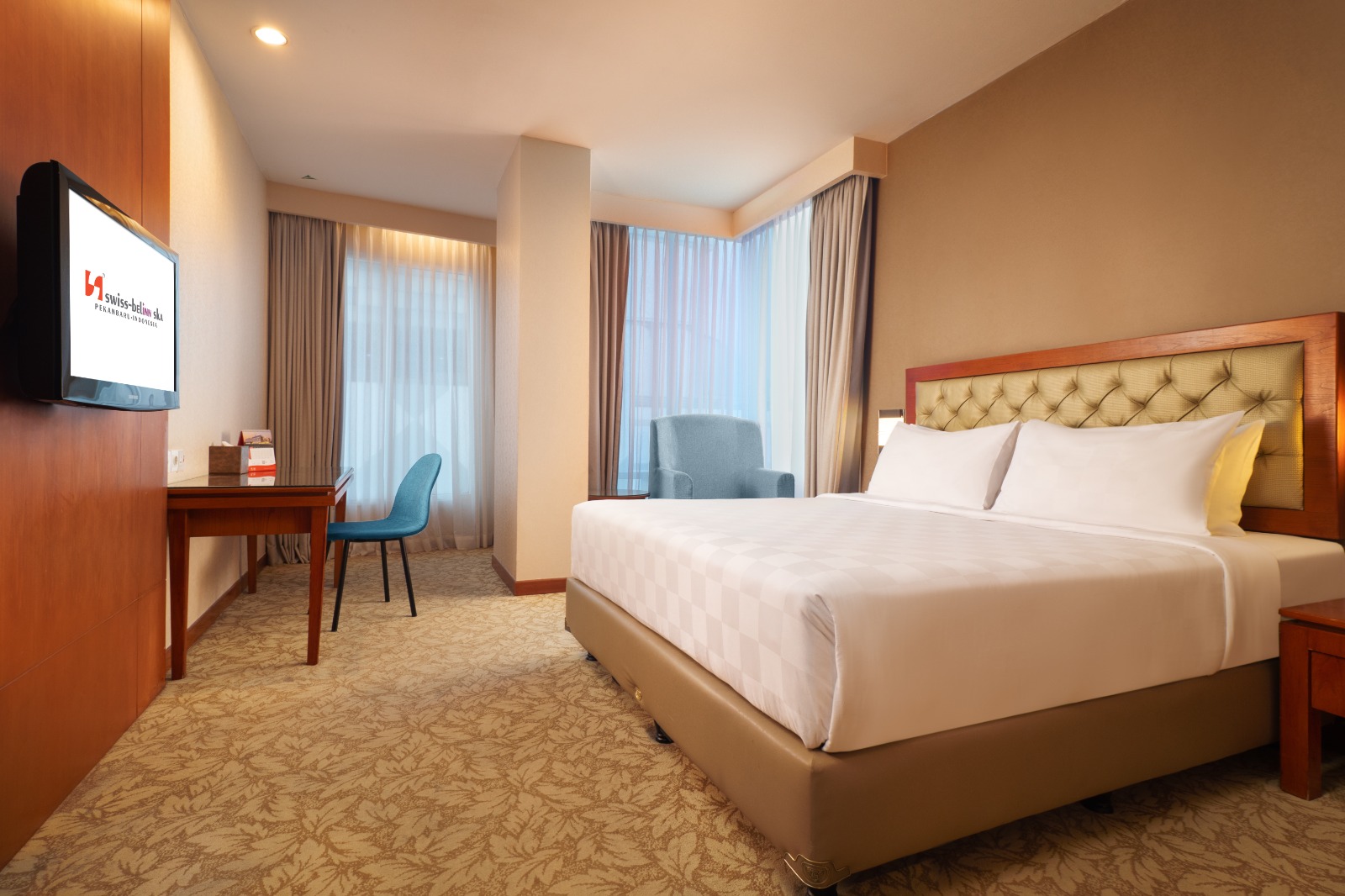 Suasana kamar di Swiss Belinn SKA yang nyaman dan bebas asap rokok.