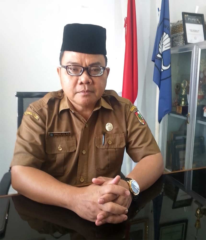 Dr Asbullah - Kepala SMPN 25 Pekanbaru
