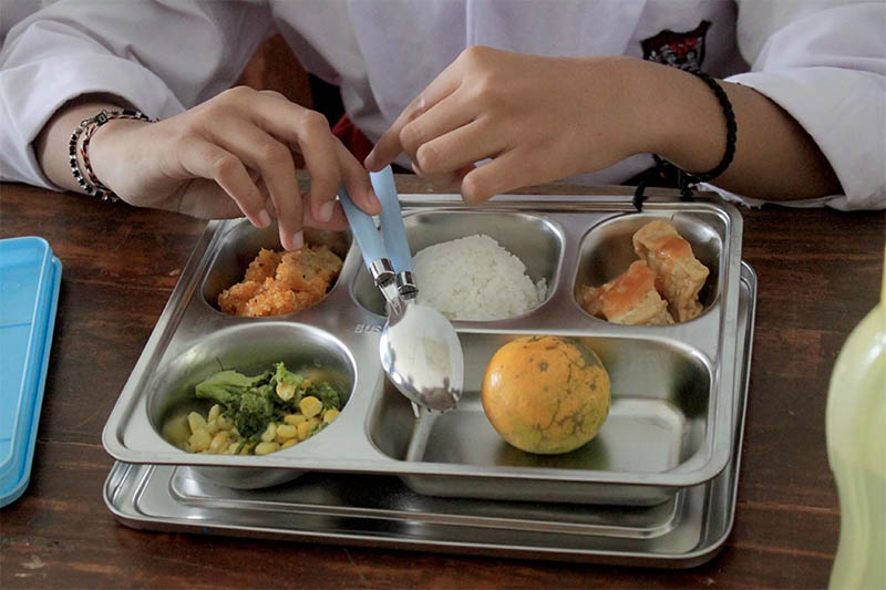 Ilustrasi program makan bergizi gratis atau MBG.