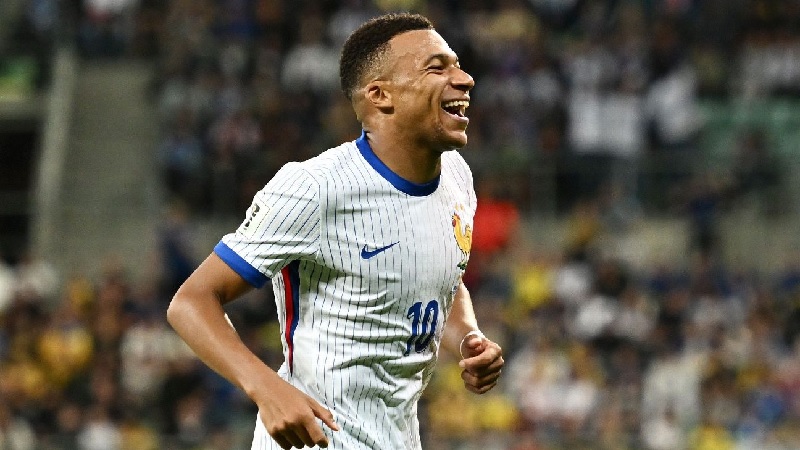Kylian Mbapp&eacute; merayakan gol kedua Prancis dalam kemenangan 2-0 atas Ukraina 2-0 dalam kualifikasi Piala Dunia 2026.  Mateusz Slodkowski/Getty Images