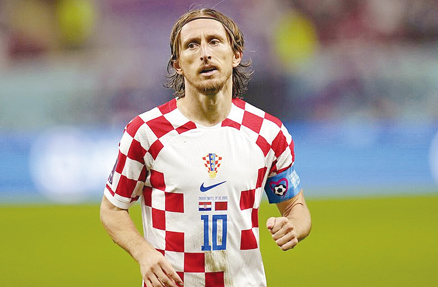 Kapten Kroasia, Luka Modric ketika berlaga dalam perebutan juara 3 melawan Maroko di Piala Dunia 2022. Modric bakal merasakan Piala Dunia 2026 dengan syarat bisa mengalahkan Kepulauan Faroe di Stadion Rujevica, Rijeka, dini hari nanti (15/11/2025).