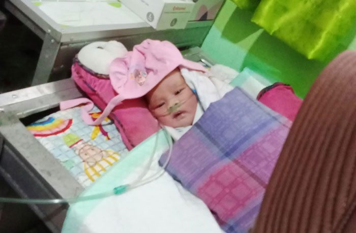 Bayi mungil berjenis kelamin laki-laki ditemukan warga dalam karung goni di Desa Pinggir, Kecamatan Pinggir, Bengkalis, Ahad (30/11/2025).