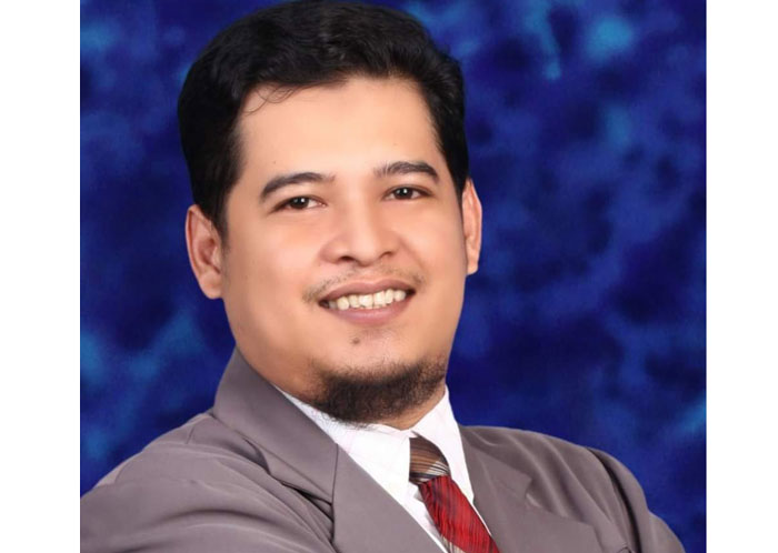 Dr Moris Adidi Yogia