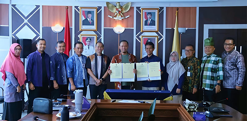 Penandatanganan kesepakatan kerja sama antara Wako Agung Nugroho dan BPJS Kesehatan yang berlangsung di Komplek Perkantoran Pemerintah Kota Pekanbaru, Tenayan Raya.