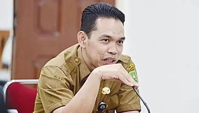 Kepala Dinas Pendidikan Provinsi Riau Erisman Yahya