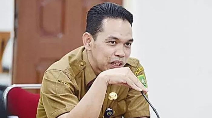 Kepala Dinas Pendidikan Provinsi Riau Erisman Yahya