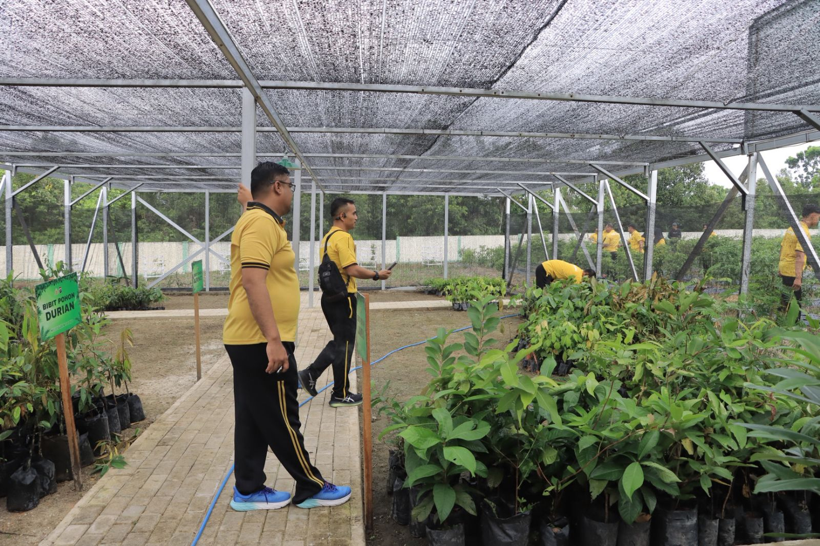 Kapolres Kampar AKBP Boby Putra Ramadhan S saat meninjau Bank Sampah di Jalan Tuanku Tambusai, Bangkinang Kota, Sabtu (24/1/2026).