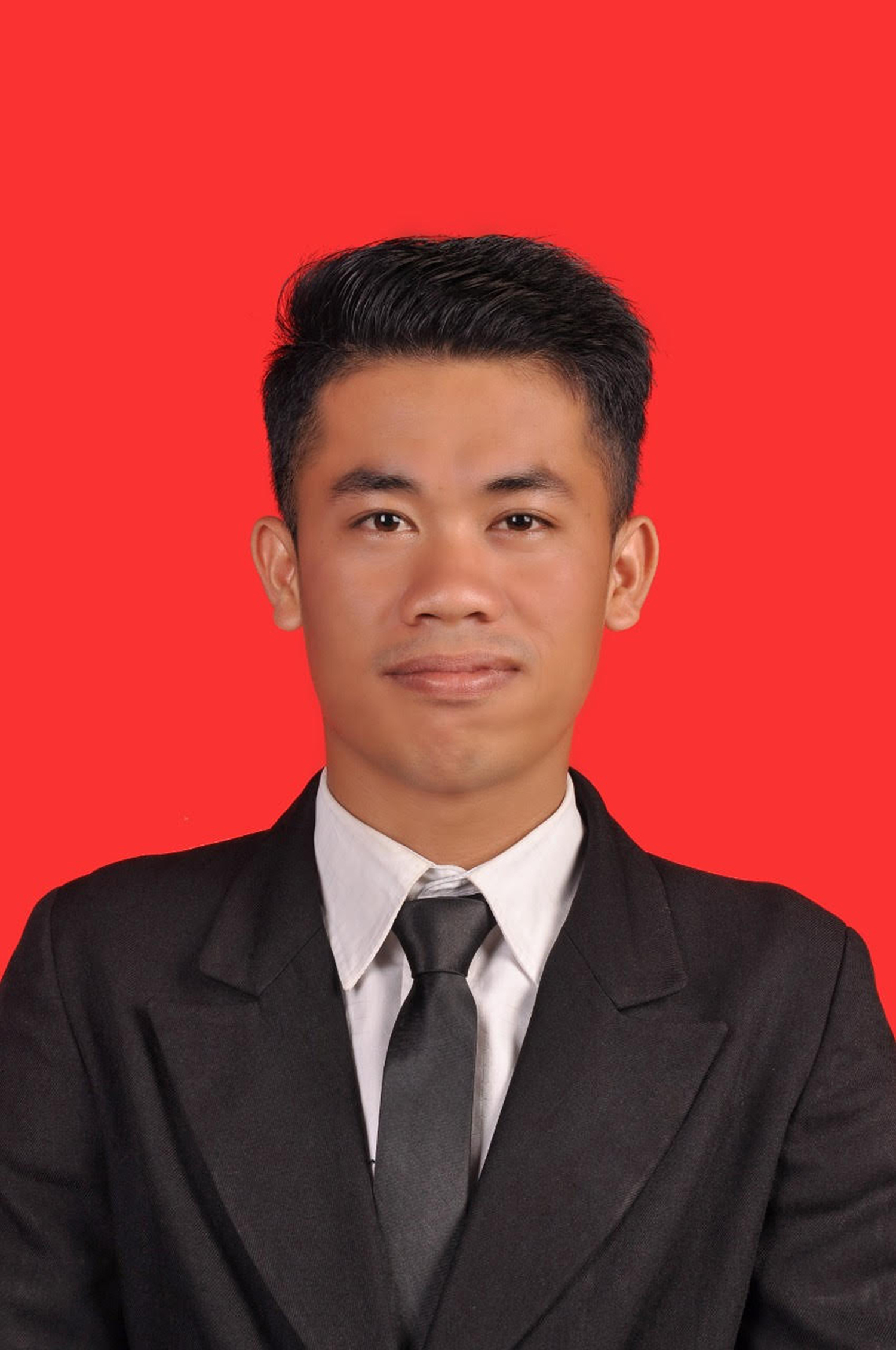 Likon Lubis, Guru PPKn di SMA Darma Yudha Pekanbaru.