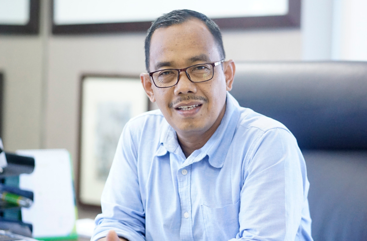 Direktur Riau Pos Asmawi Ibrahim.