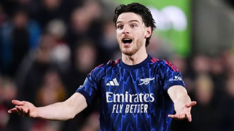 Gelandang Arsenal Declan Rice bereaksi selama pertandingan Liga Premier kontra Brentfordi Stadion Community Gtech, London. Jumat (13 /2/2026) dini hari WIB.