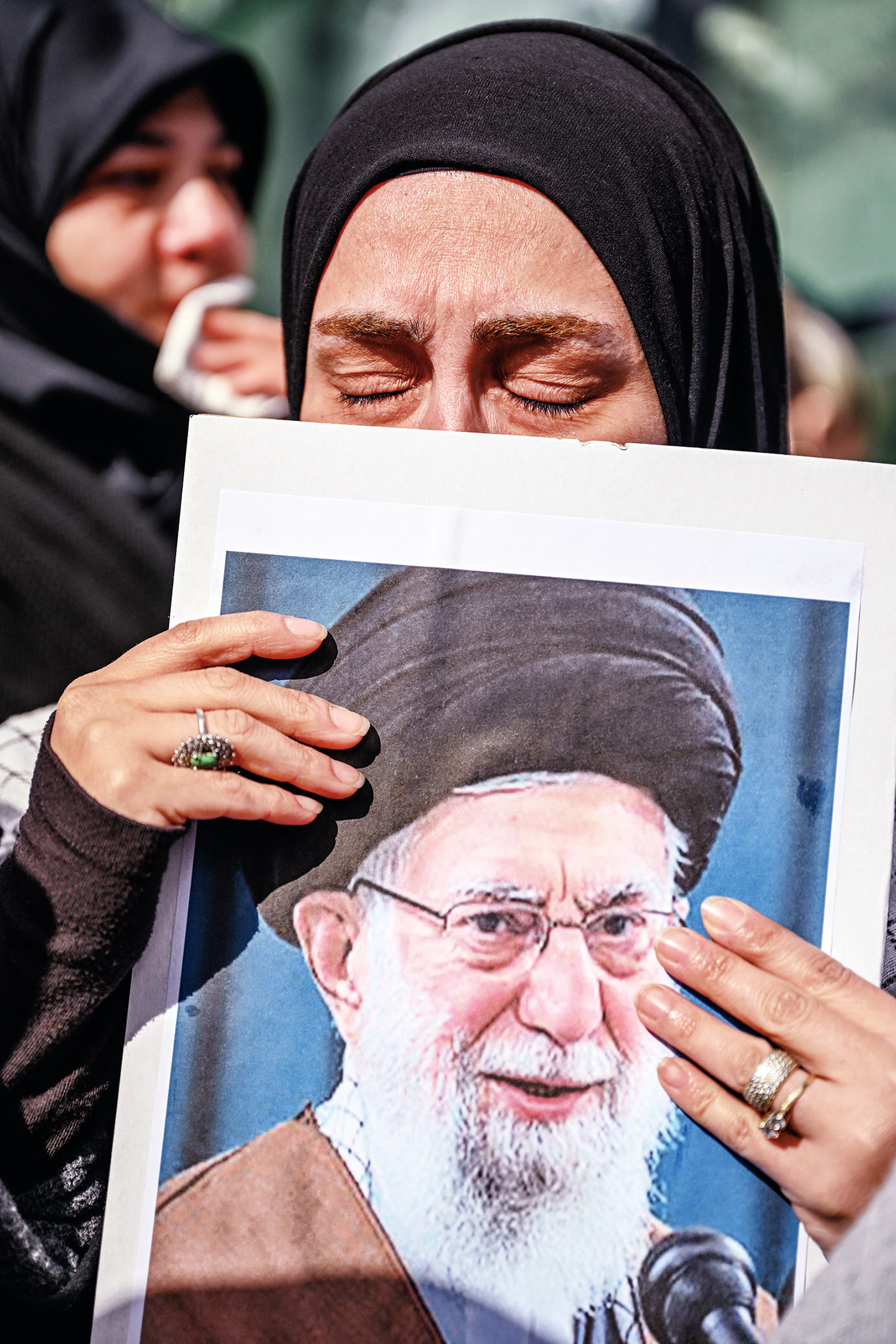 A protestors holds a portrait of Ayatollah Ali Khamenei as they gather to protest against the US and Israel attack of Iran and the killing of the Supreme leader in front of Israel Consulate in Istanbul on March 1, 2026. The United States and Israel launch