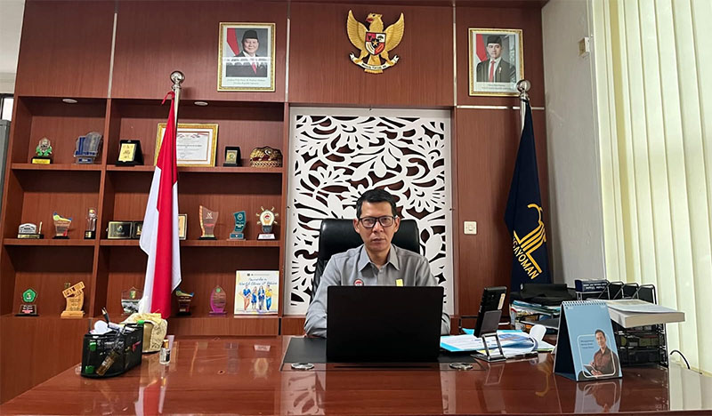 Kepala Divisi Pelayanan Hukum Kanwil Kemenkum Riau Febri Mujiono membuka kegiatan Fasilitasi Pembentukan Merek Kolektif dan Sentra KI secara virtual, Senin (2/3/2026).  