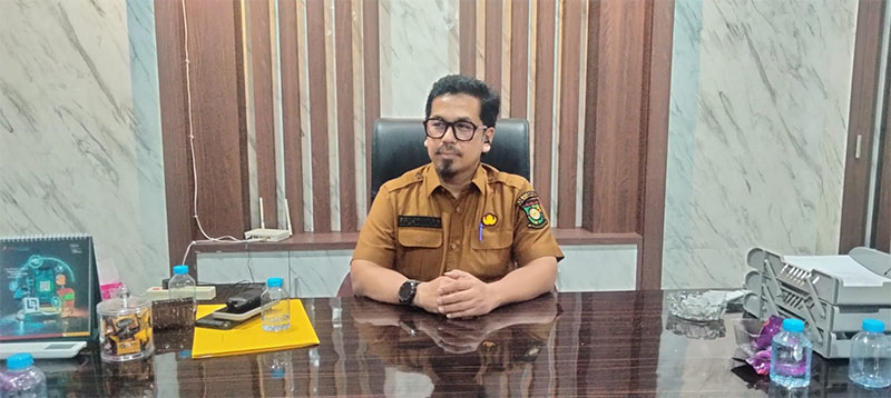 Plt Kepala Dinas PUPR Kabupaten Kampar Afrudin Amga 