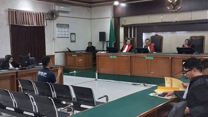 Terdakwa Jhonny Andrean menghadapi dakwaan perkara perintangan penyidikan dugaan kasus korupsi Sekretariat DPRD Kota Pekanbaru di PN Pekanbaru pada Selasa (17/6/2026).