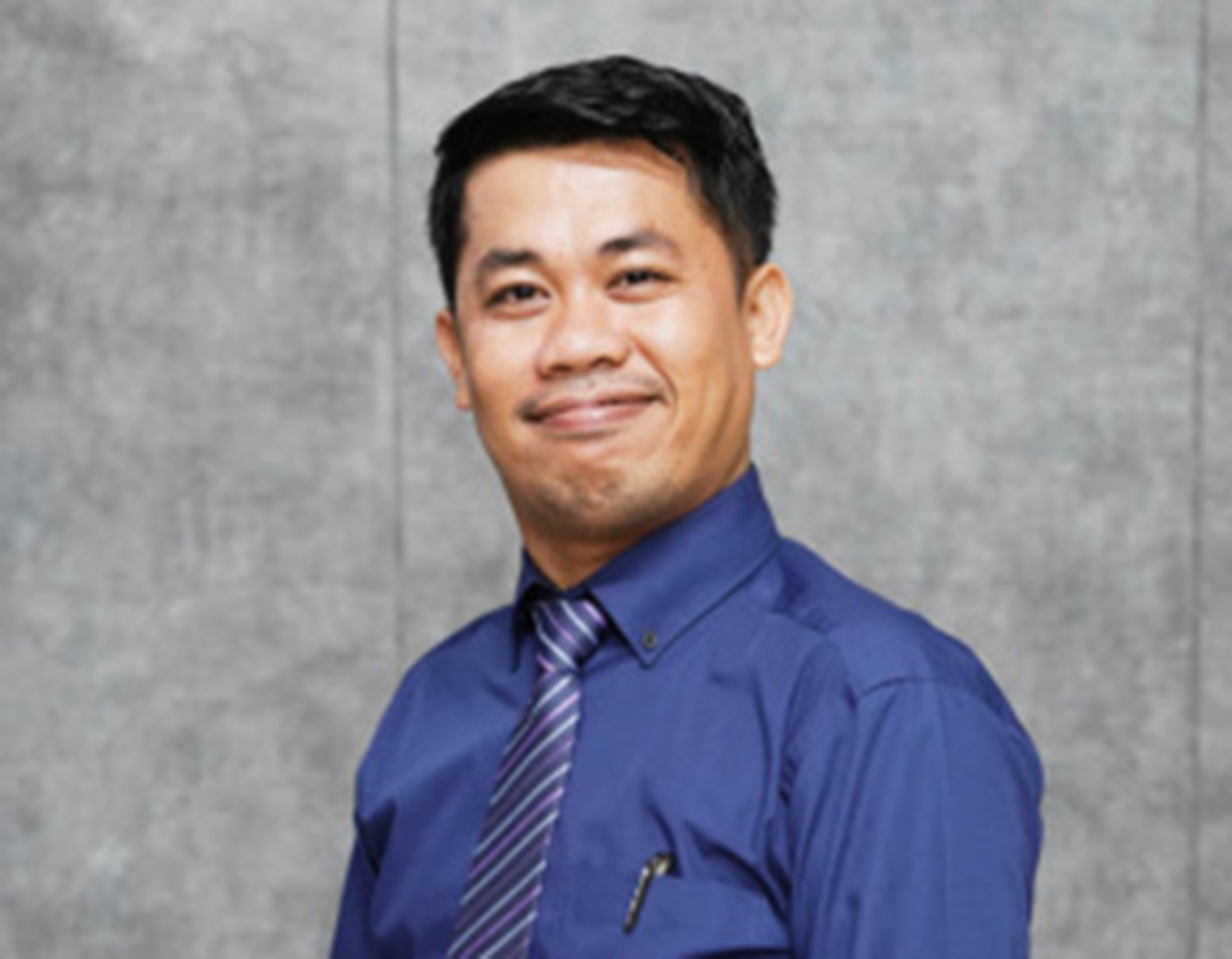 Likon Lubis, Guru Pendidikan Pancasila SMA Darma Yudha Pekanbaru.