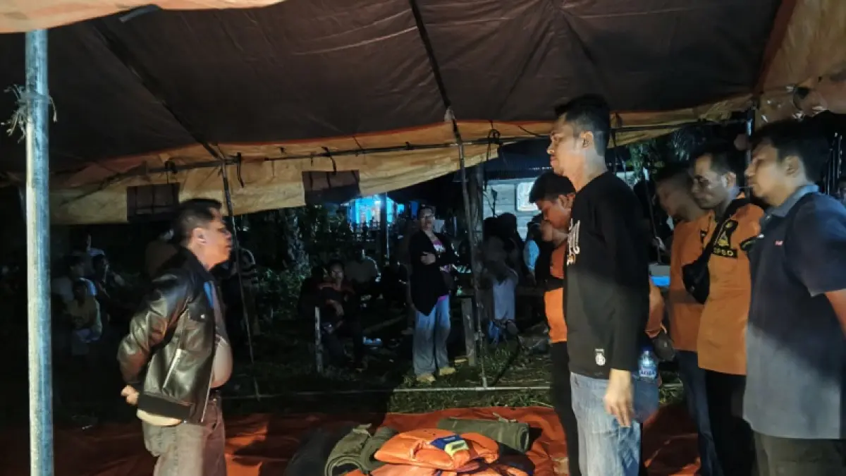 BPBD Kuansing mendirikan tenda di Desa Teluk Pauh Kecamatan Cerenti untuk melakukan pencarian anak yang tenggelam di Sungai Kuantan, Jumat (3/4/2026) malam.(BPBD Kuansing)