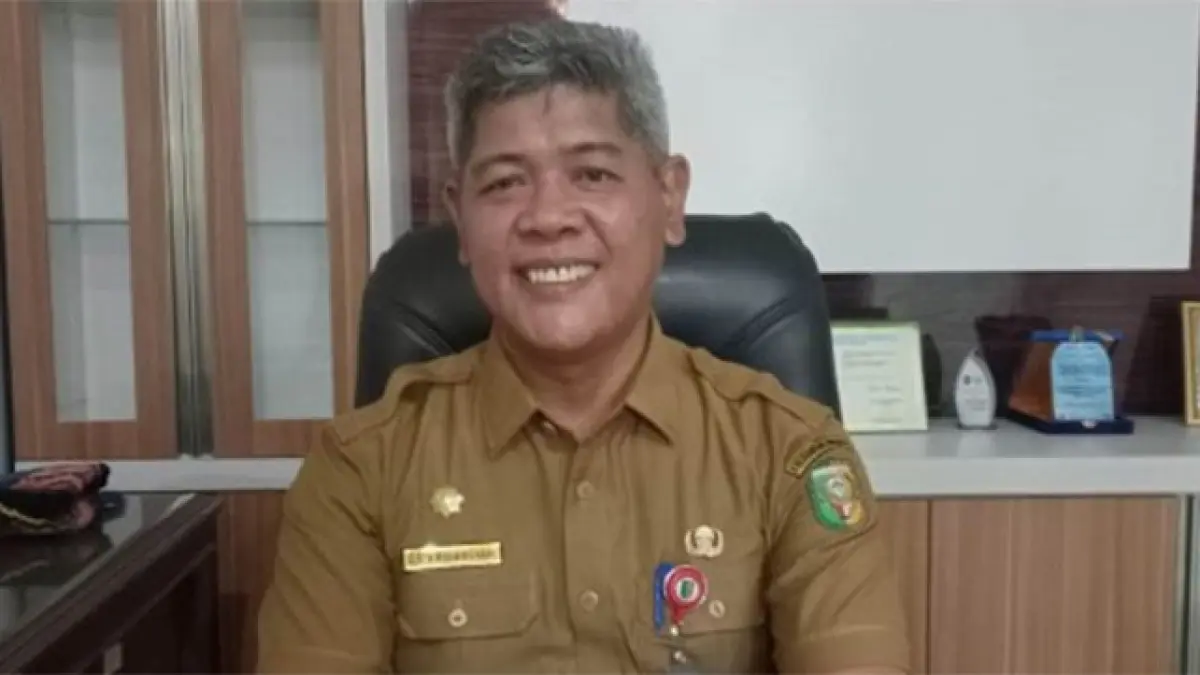 Kepala DPMPTSP Kuansing, Erdiansyah. (DOK RIAUPOS.CO)