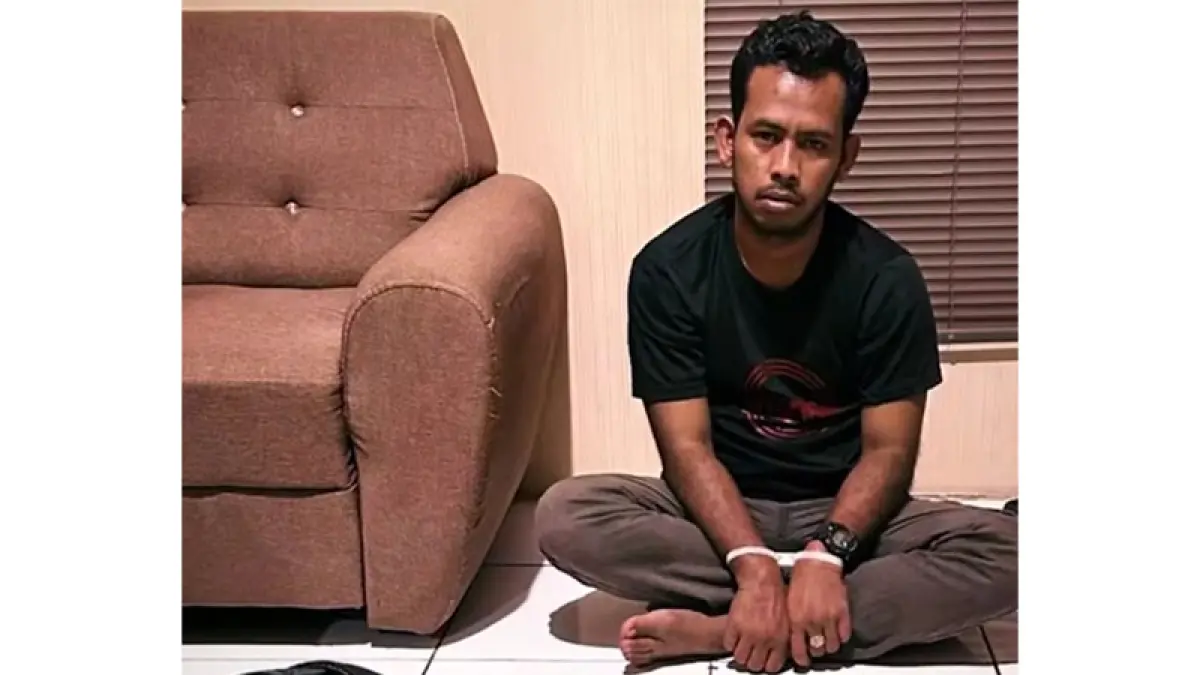 Tersangka kurir sabu sebanyak 21,9 Kg diamankan di Bengkalis, Rabu (15/4/2026) hini hari. Foto tangkapan layar video  Dittipidnarkoba Bareskrim Mabes Polri.
