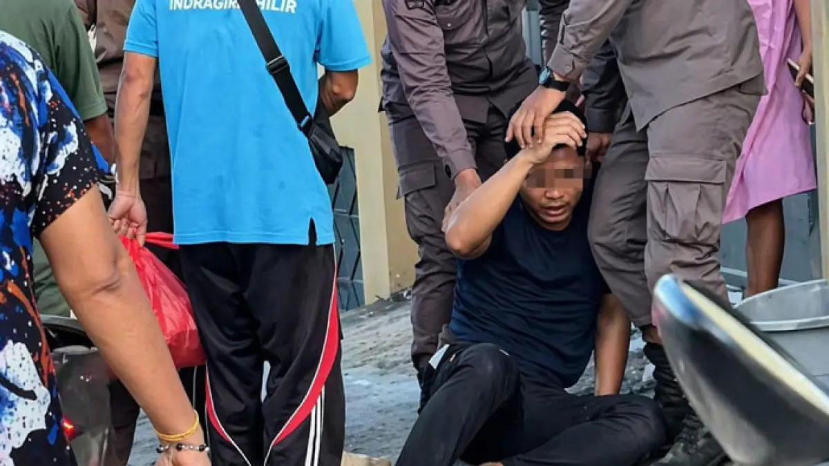 Tahanan Kejari Inhil berhasil ditangkap kembali di Jalan Subrantas setelah mencoba melarikan diri ketika hendak dibawa masuk ke dalam Lapas Tembilahan, Kamis (23/4/2026).(Istimewa)