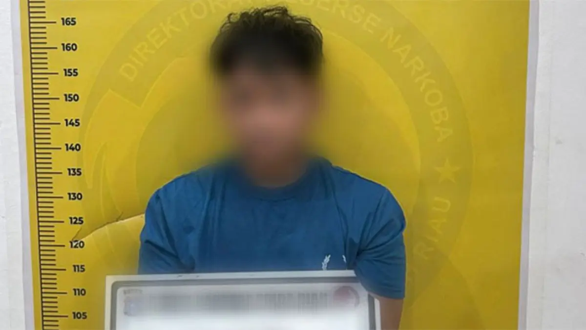 Salah satu tersangka yang diamankan Polda Riau. (ISTIMEWA)