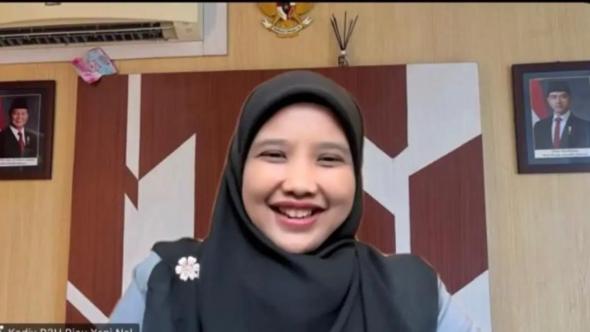 Kepala Divisi P3H Kanwil Kemenkum Riau Yeni Nel Ikhwan saat memimpin rapat harmonisasi secara daring pada Selasa (2/6/2026). (Humas Kanwil Kemenkum Riau)