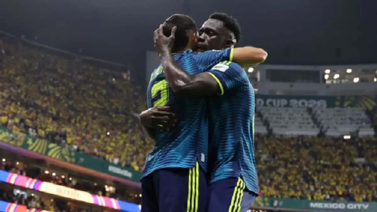 Bek Daniel Munoz (kiri) melakukan selebrasi usai mencetak gol pembuka Kolombia saat mengalahkan waki Asia Uzbekistan 3-1 di Grup K Piala Dunia 2026. (Getty Image)