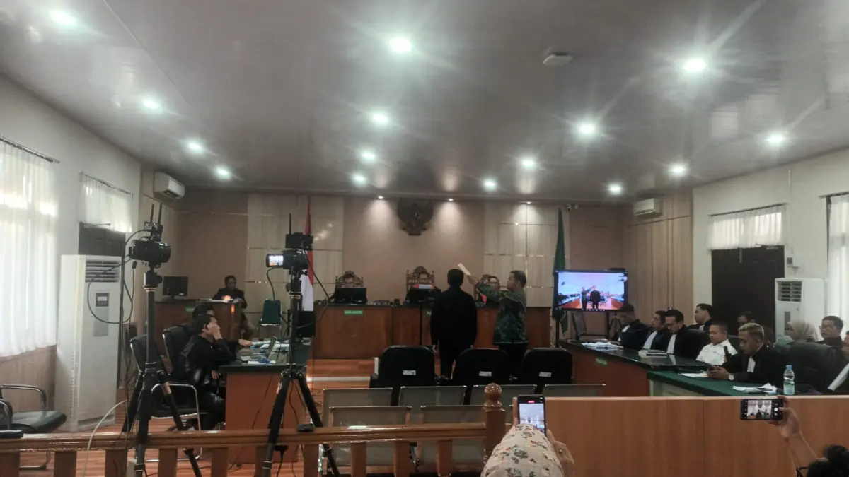 Ahli Psikologi Forensik Reza Indragiri Amriel diambil sumpah sebelum memberikan keterangan di sidang perkara korupsi dengan terdakwa Abdul Wahid, Kamis (25/6/2026).(HENDRAWAN KARIMAN/RIAUPOS.CO)