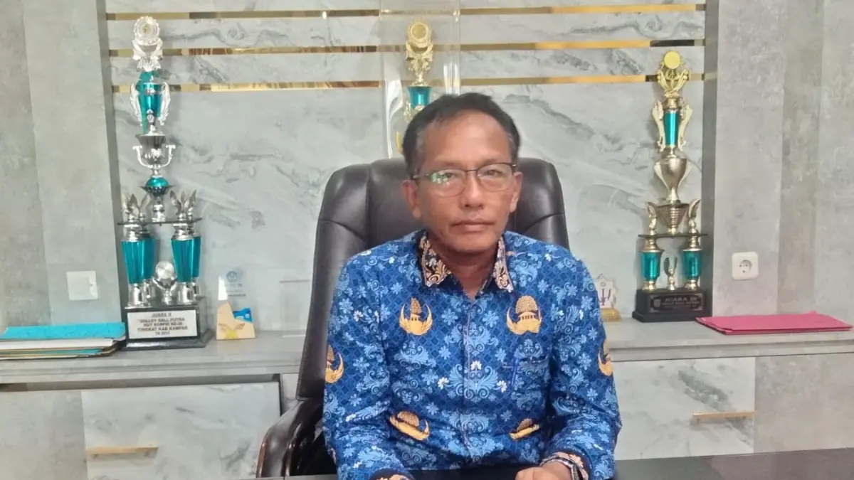 Plt Kadisdikparpora Kampar Helmi.(DOK.RIAUPOS.CO)