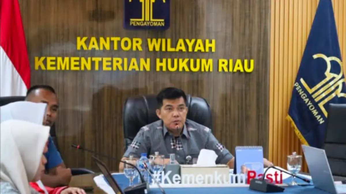 Kepala Kanwil Kemenkum Riau Rudy Hendra Pakpahan mengikuti secara virtual kegiatan pembinaan notaris di Kabupaten Kuansing pada Kamis (30/7/2026). (Humas Kanwil Kemenkum Riau untuk Riaupos.co)