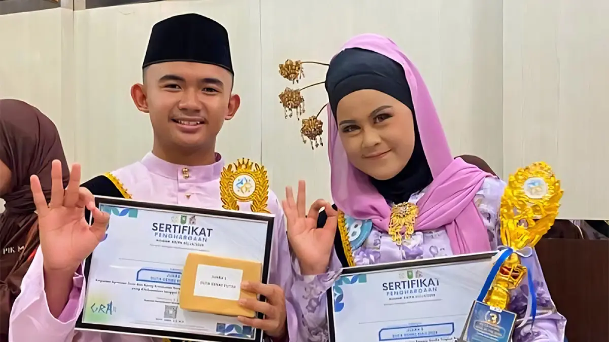 JUARA: Siswa asal Kabupaten Kepulauan Meranti yaitu Muhammad Haikal berhasil meraih predikat Duta GenRe Putra Provinsi Riau 2026 dan Suci Amanda Nurhalima Juara 3 Duta GenRe Putri Provinsi Riau, Jumat (31/7/2026). (DINSOS P3AP2KB KEPULAUAN MERANTI UNTUK RIAU POS)