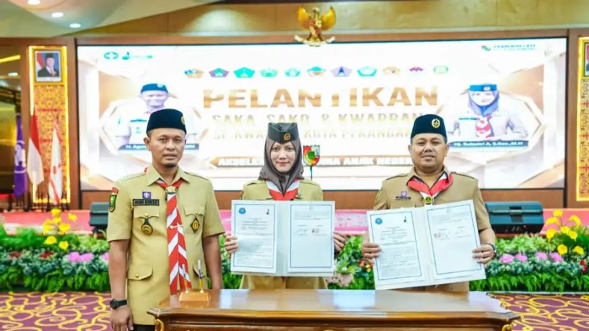 Wako Pekanbaru Agung Nugroho dan Ketua Ketua Kwarcab Gerakan Pramuka Kota Pekanbaru Sulastri Agung saat menghadiri acara pelantikan kepengurusan Saka, Sako dan Kwarran se-Kwarcab Kota Pekanbaru, Jumat (7/8/2026). (Istimewa)