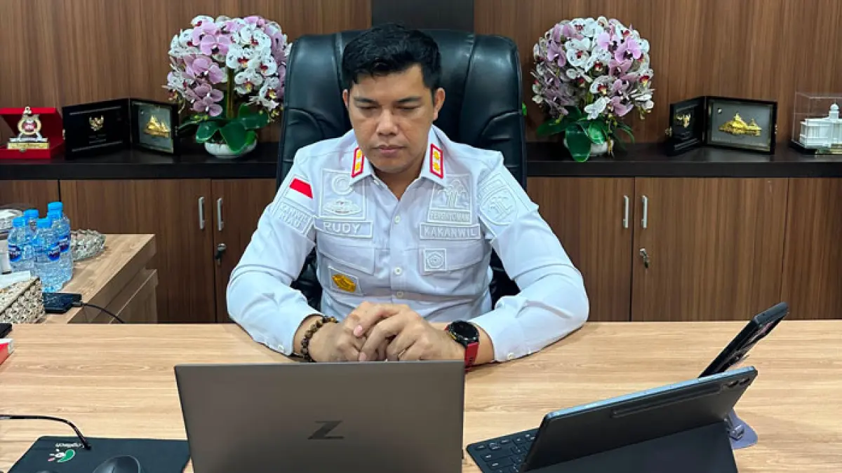 Kakanwil Kemenkum Riau Rudy Hendra Pakpahan mengikuti Seminar Aksi Perubahan Pelatihan Kepemimpinan Administrator (PKA) Angkatan LXXVII, secara virtual, Rabu (12/8/2026). ( Humas Kanwil Kemenkum Riau untuk Riaupos.co)