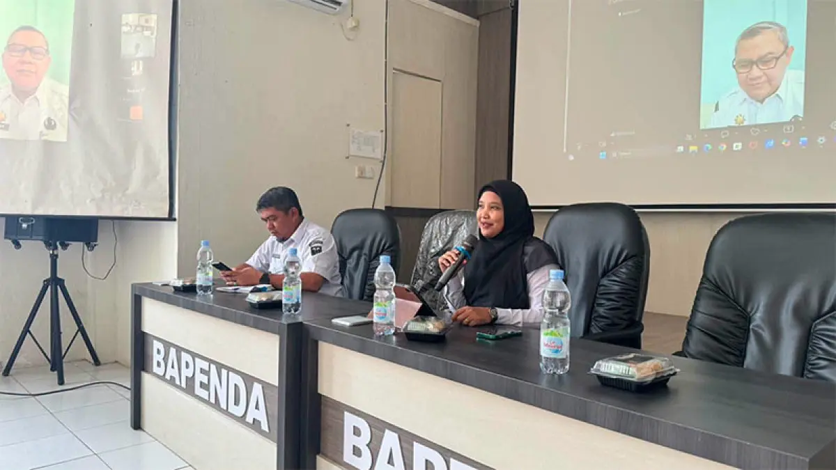 Kepala Divisi P3H Kanwil Kemenkum Riau Yeni Nel Ikhwan memimpin rapat koordinasi harmonisasi dua Ranperda Rohil pada Rabu (12/8/2026). Humas Kanwil Kemenkum Riau
