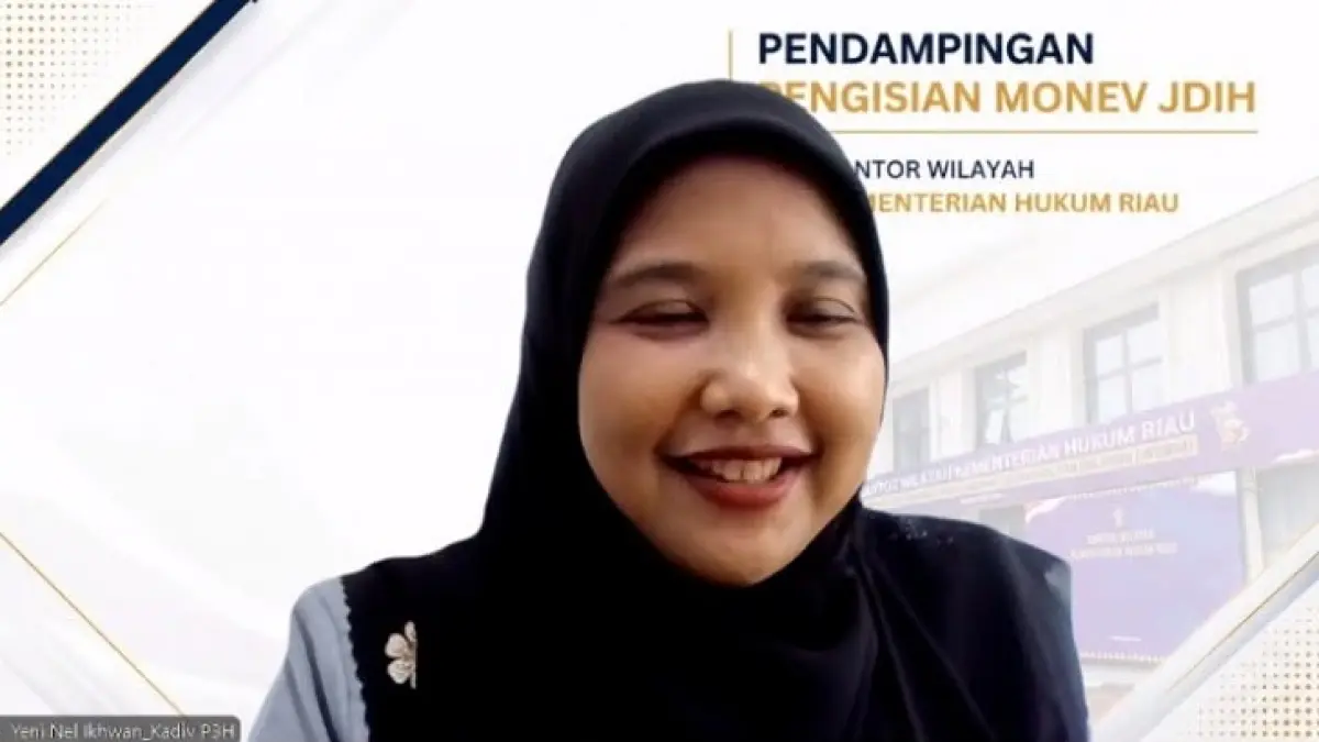 Kepala Divisi P3H Kanwil Kemenkum Riau Yeni Nel Ikhwan memberikan arahan secara virtual pada kegiatan Pendampingan Pengisian Monitoring dan Evaluasi Penyelenggaraan JDIH Tahun 2026, Selasa (18/8/2026). (Humas Kanwil Kemenkum Riau)