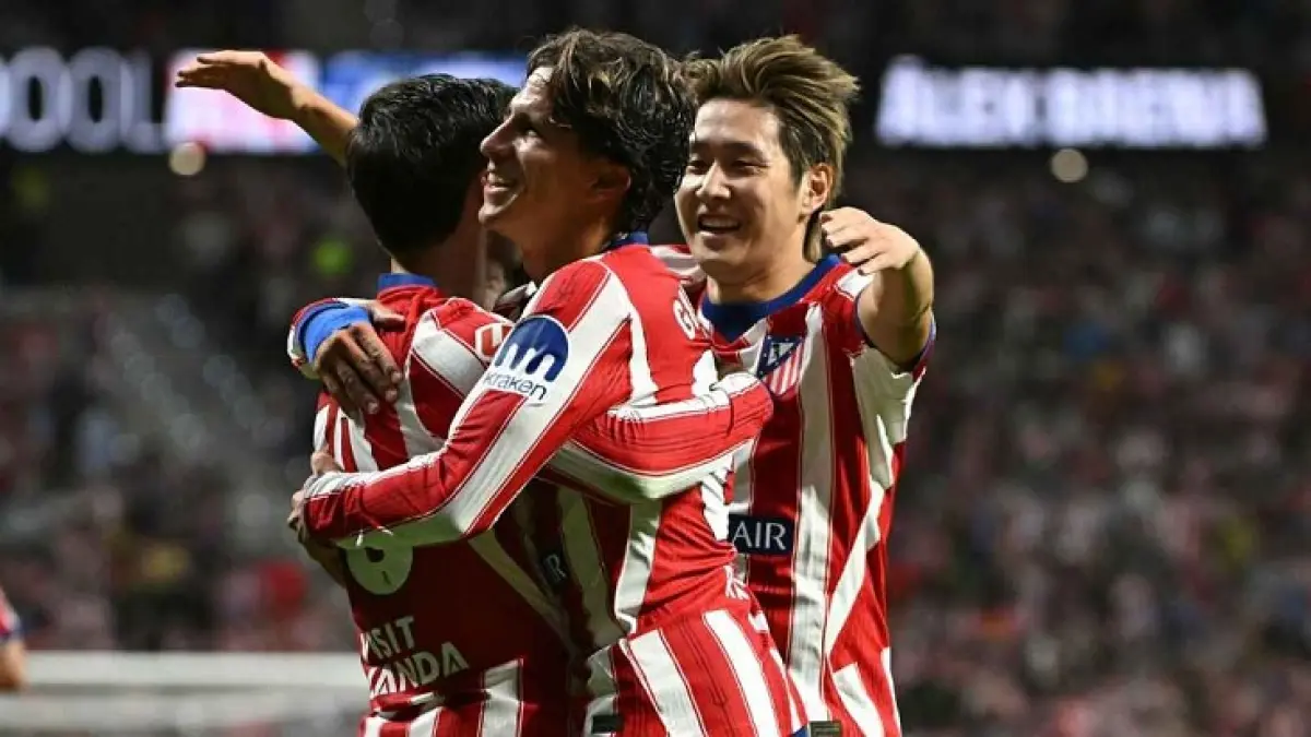 Para pemain Atletico merayakan gol setelah membobol gawang Malaga dalam pertandingan pembuka LaLiga mereka pada Kamis dini hari WIB. (Getty Images)