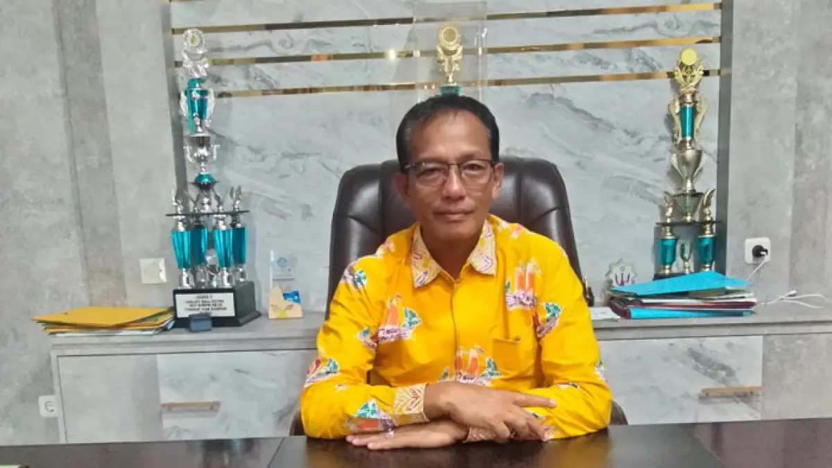 Plt Kadisdikpora Kabupaten Kampar, Helmi. (Kamaruddin/Riaupos.co)