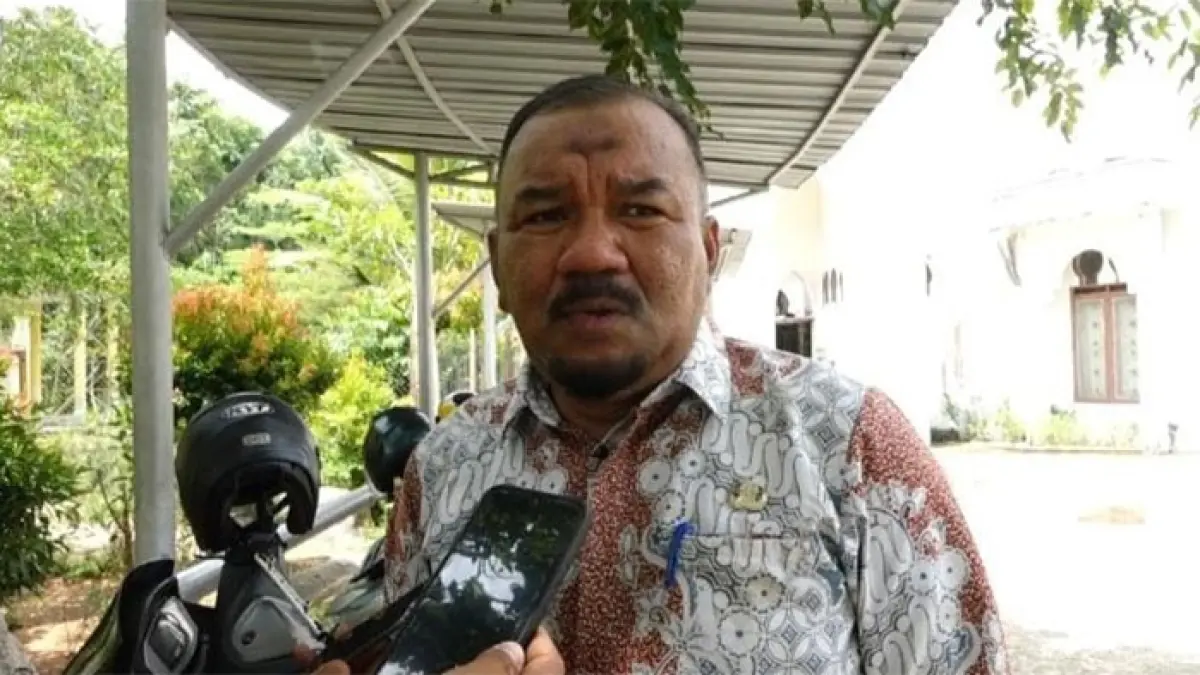 Kepala DLH Rohil Suwandi SSos. (Dok Riaupos.co)