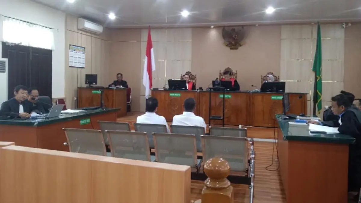Dua terdakwa perkara suap terhadap Bupati Nonaktif Suhardiman Amby menghadapi dakwaan JPU KPK di Pengadilan Tipikor Pekanbaru, Jumat (18/9/2026). (Hendrawan Kariman/Riaupos.co)