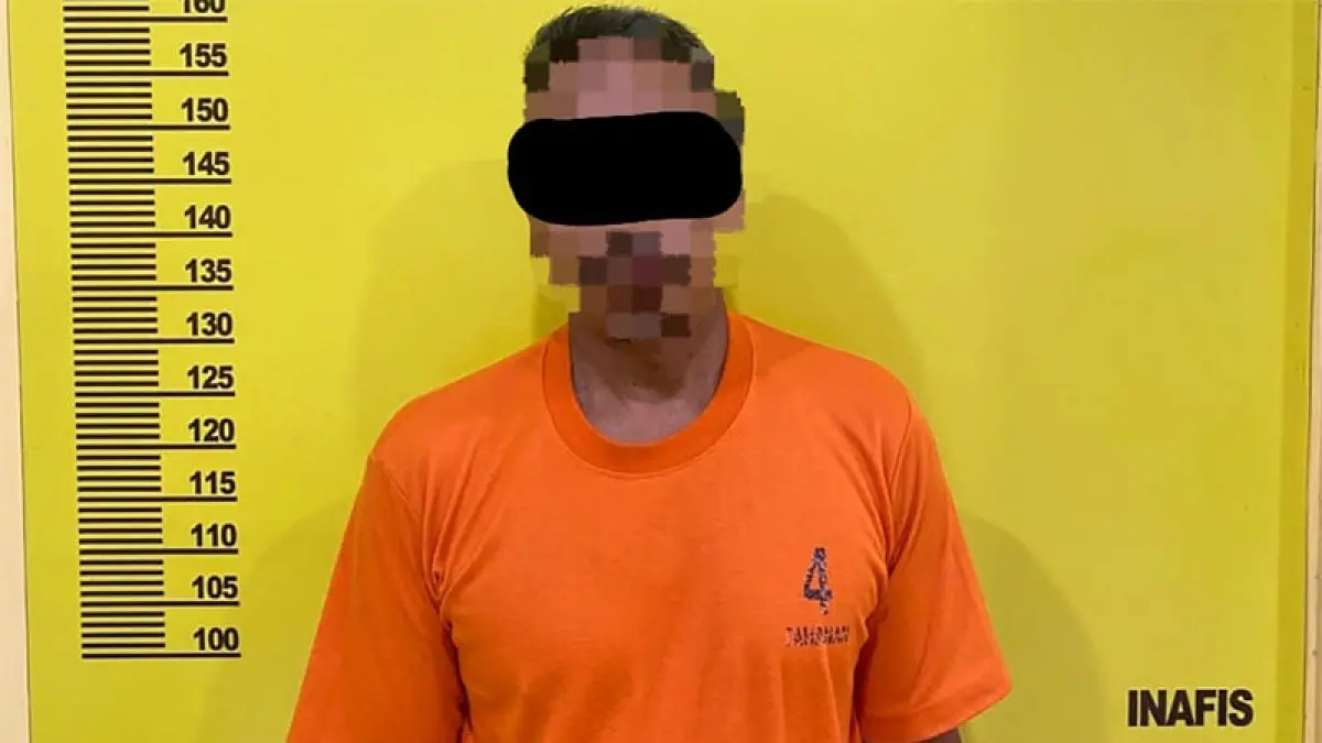 Salah seorang tersangka Karhutla Bukit Betabuh diamankan Polres Kuansing. (Istimewa)