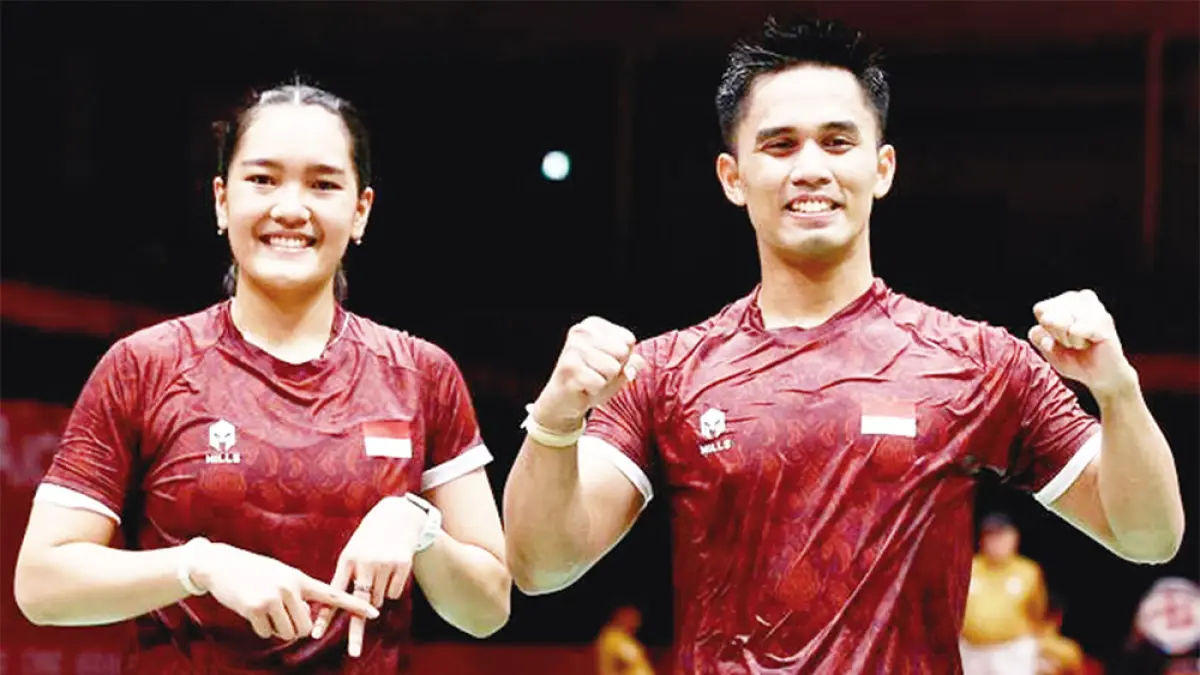Ganda campuran Indonesia Amri Syahnawi/Nita Violina Marwah merayakan keberhasilan menyingkirkan wakil Korea Selatan Jo Sung Hyun/Jeong Na Eun dalam perempatfinal bulutangkis Asian Games 2026 di Ichinomiya City Municipal Gymnasium, Jepang, Ahad (27/9/2026). (PP PBSI)