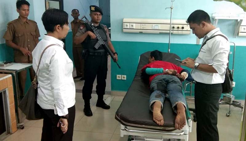 DIAMANKAN: Pelaku pengan-caman nasabah dan pembakaran BNI di Dumai diamankan polisi, Senin (11/3/2019).