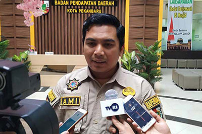 H Zulhelmi Arifin SSTP MSi (Kepala Bapenda Kota Pekanbaru)