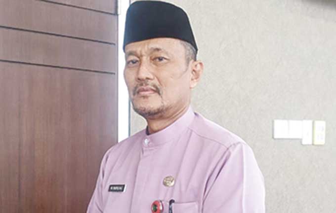 Kepala Dinas Perindustrian Perdagangan Koperasi dan UKM Riau Taufiq OH.