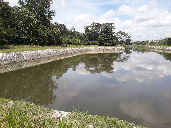 Kondisi Waduk Cipta Karya di Kecamatan Tuah Madani yang volume airnya naik usai diguyur hujan, Senin (31/10/2022).