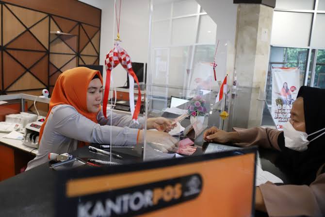 Ilustrasi, pencairan BSU Tahap 7 lewat kantor pos.