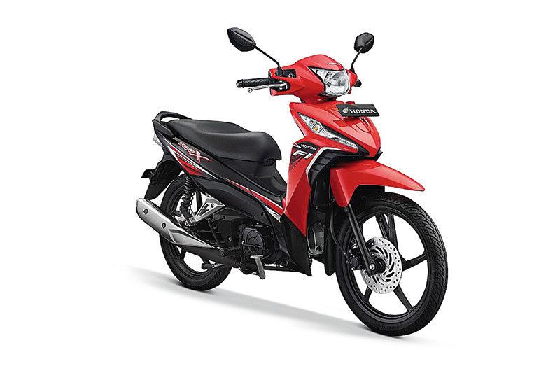 New Honda Revo-X attractive red meÂ­ruÂ­pakan satu dari beberapa sepeda motor bebek terÂ­baru keluaran PT Astra Honda Motor tahun ini. (HONDA FOR RIAUPOS.CO)