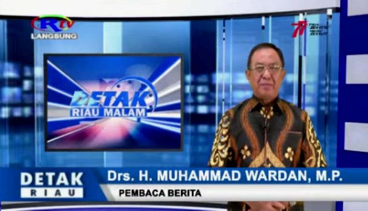 Bupati Inhil H Muhammad Wardan menjadi pembaca berita pada Detak Riau Malam di Riau Televisi, Rabu (24/8/2022) malam.