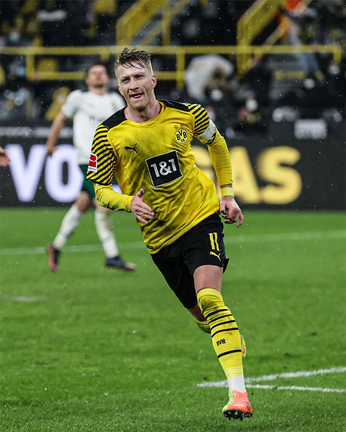 Aksi Marco Reus bersama Borussia Dortmund dalam laga Bundesliga. Kapten Dortmund itu masuk dalam incaran Manchester United.