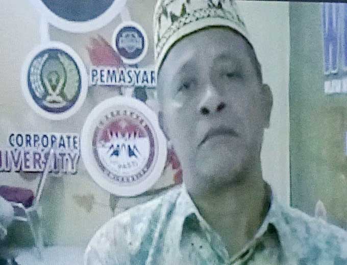 Mantan Rektor UIN Suska Riau Akhmad Mujahidin saat mengikuti sidang pembacaan putusan secara virtual di Pengadilan Negeri Pekanbaru, Rabu (18/1/2023).