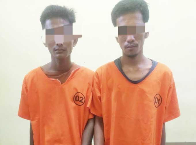 Jajaran Polsek Kampar Kiri Hilir menangkap dua tersangka narkoba jenis sabu-sabu saat duduk di sungai putaran di Desa Simalinyang, Kecamatan Kampar Kiri Tengah, Kabupaten Kampar, Senin (30/1/2023).